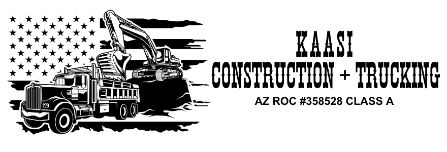 Construction truck and excavator with American flag.